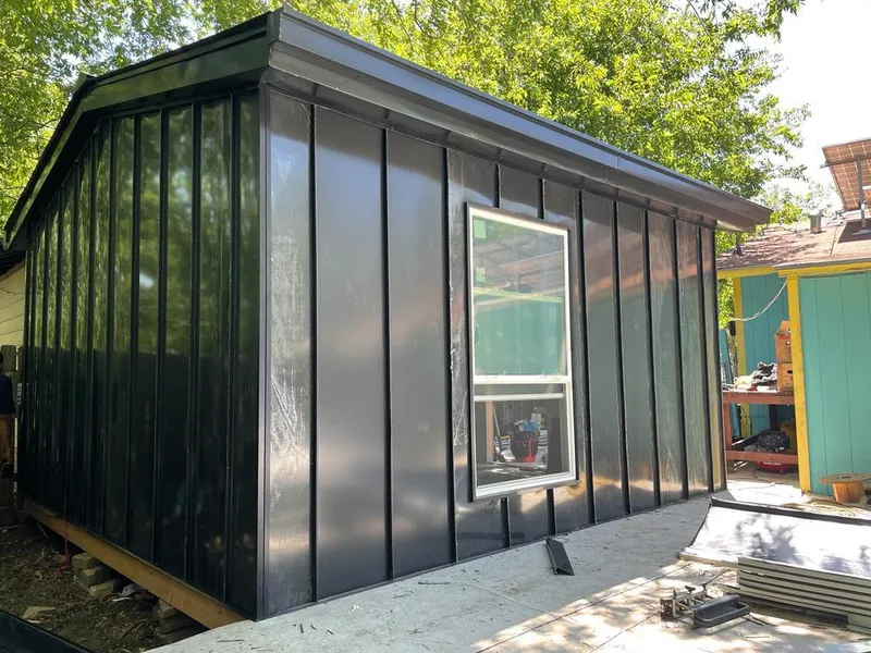 Black standing seam metal wall panels for Metal Roof Installation in Union Grove